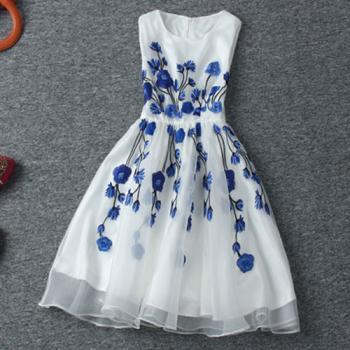 white dress with blue embroidery