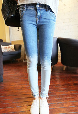 ripped tight blue jeans with the cuff